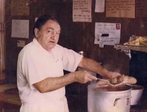 Pat Santoro  making a meatball Sandwich, 1956